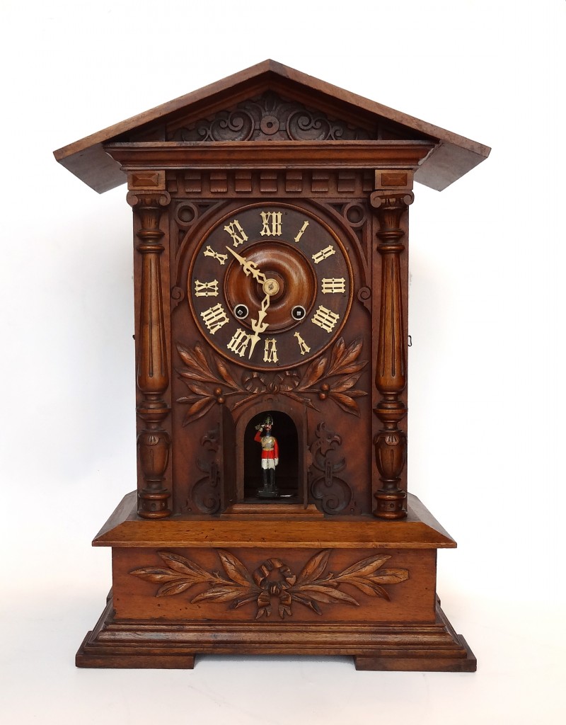 Black Forest Carved Trumpeter Clock - Carlton Clocks